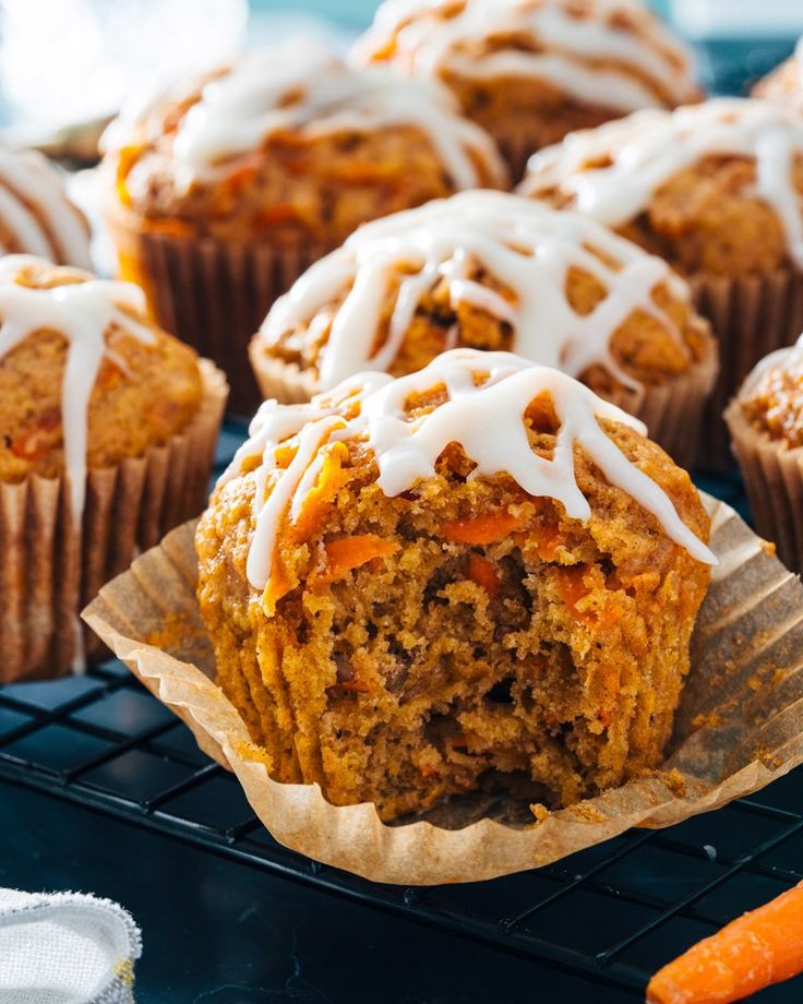 this picture contains a couple of Carrot Cake Muffins 