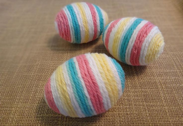 this picture contains Yarn Easter Eggs