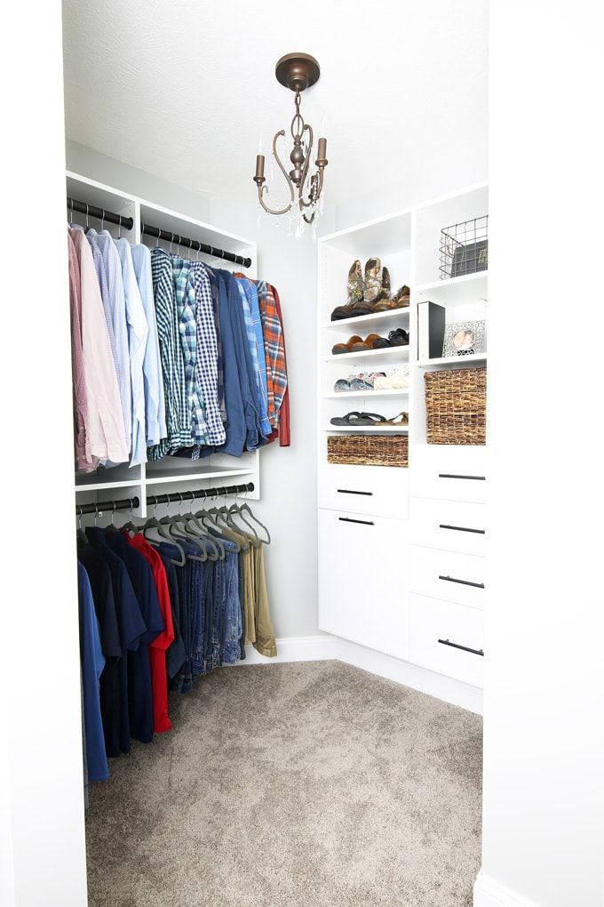 this is a closest with clothes vertically hanged for storage solution