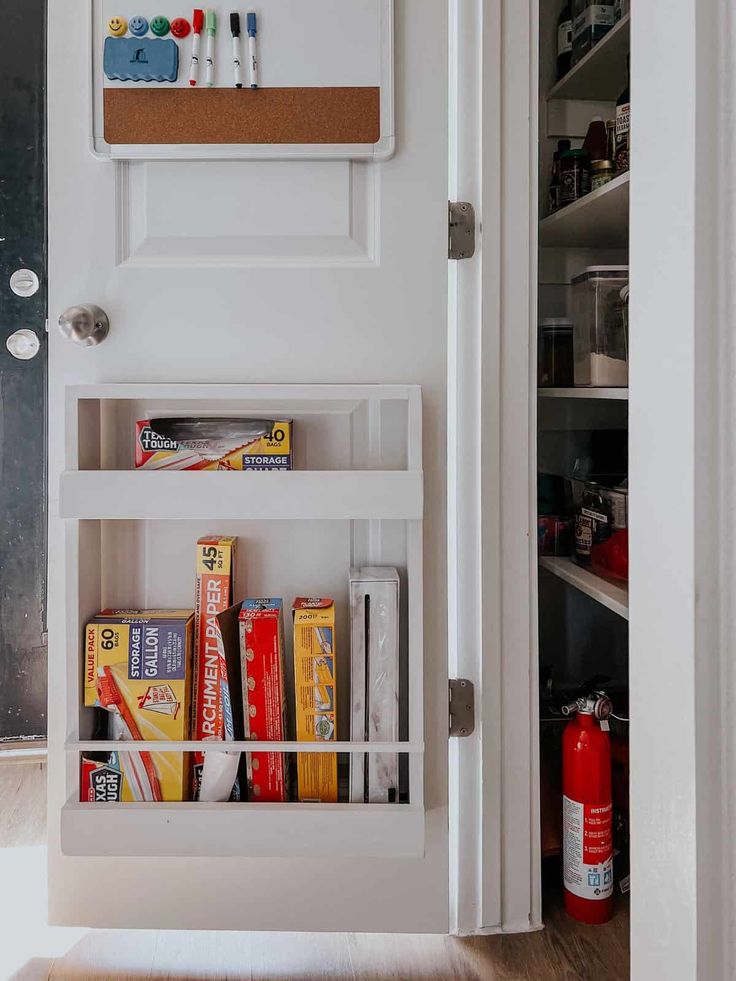 this is a Closet Door with stuffs hanging on it for storage 