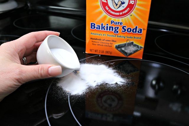 this is a magic cleaning hack: cleaning your stove with baking soda